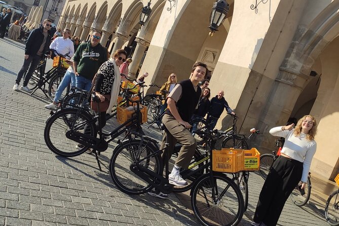 Discover Kraków by Bike with a Dutch guide - Rynek Główny Central Square, Cloth Hall, and the trumpeter legend