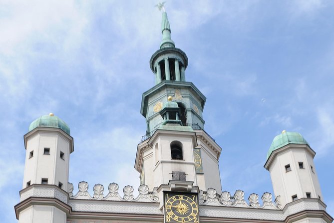 Discover Poznan: Walk, Take a tram and have a traditional snack - St Stanislaus Fara Church: Baroque Architecture and Organ Stories