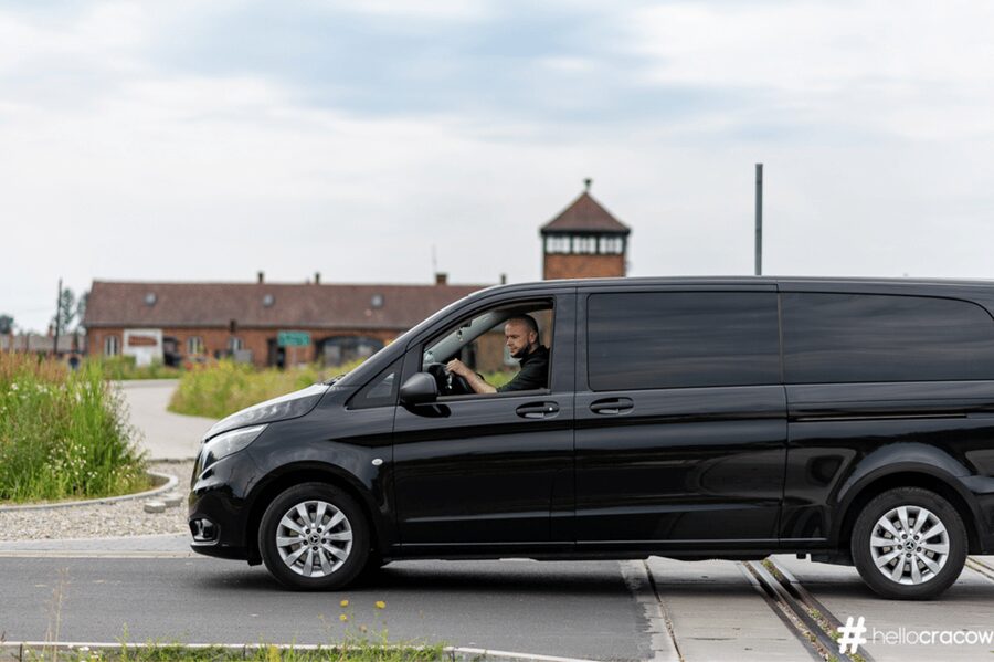 From Krakow: Auschwitz-Birkenau Guided Tour Guaranteed Time - Auschwitz I: Enter Through Arbeit macht frei and Get the Main Story