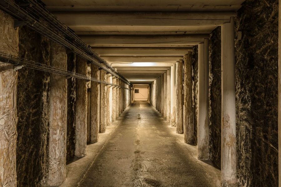 From Krakow: Wieliczka Salt Mine Half-Day Guided Tour - Nine levels of salt chambers: saline lakes, timber, and mining gear