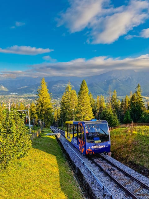 From Krakow: Zakopane Tour with Cable Car + Tasting & Pickup - Gubałówka cable car: views, snacks, and the reality of queues