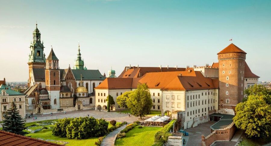 From Warsaw: Guided Tour to Auschwitz-Birkenau and Krakow - Auschwitz-Birkenau Pickup, Drive, and the Welcome-to-Reality Moment