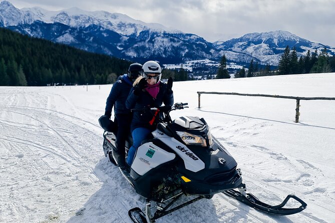 Full day Tour Zakopane Snowmobiles Thermal Baths from Krakow - Chocholow’s UNESCO wooden village stop, and the Sunday catch