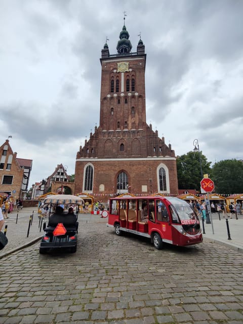Gdansk: City Sightseeing Tour Eco Electric Buggy Golf Cart ! - From the Crane to Ship Soldek: the shipyard chapter that ties it together