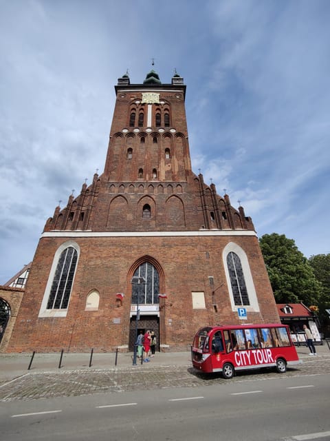 Gdansk: City Sightseeing Tour Eco Electric Buggy Golf Cart ! - Culture and everyday city life: Market Hall, Great Mill, Railway Station, and Street rhythm