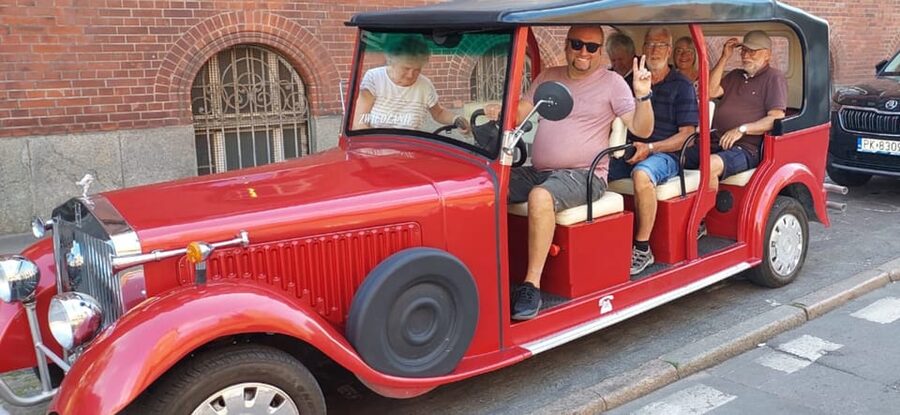 Gdańsk: City Tour by Electric Golf Cart - Highland Gate and Great Armory, how walls teach history