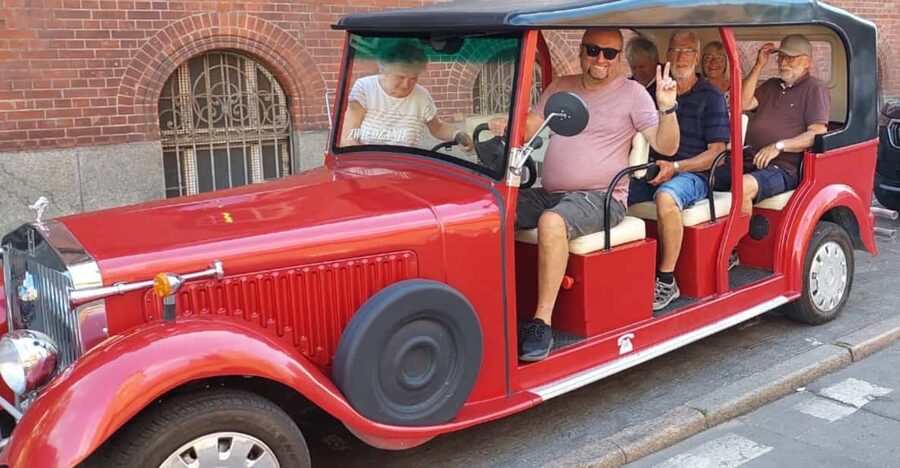 Gdańsk: City Tour by Electric Golf Cart - Granary Island and the Crane, picturing shipyard life