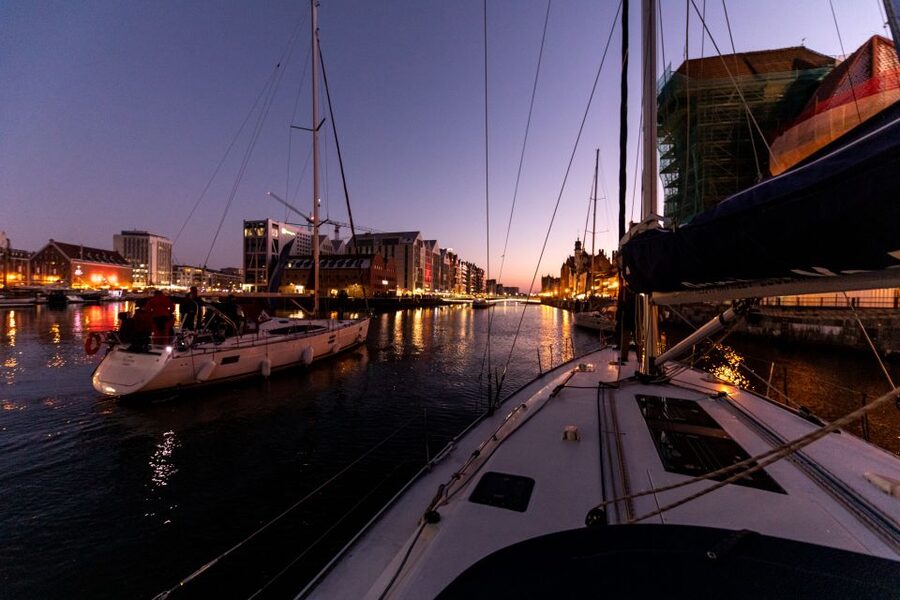 Gdańsk: Scenic Sunset Cruise with Welcome Drink - Onboard comfort: decks, blankets, toilet, and warm drinks