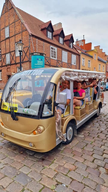 Gdansk: Shared or Private City Tour Sightseeing By Golf Cart - The start at the church, then the Old Town kicks into gear