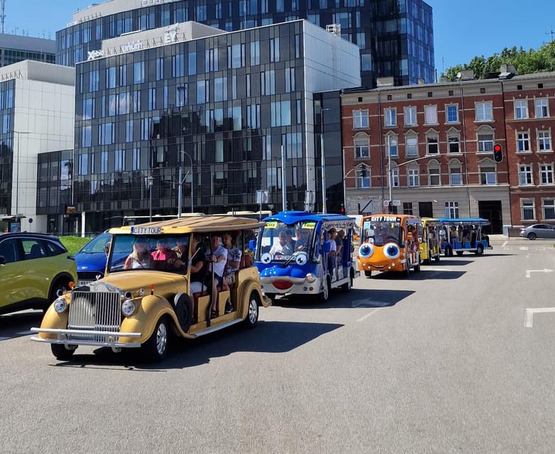 Gdansk: Shared or Private City Tour Sightseeing By Golf Cart - Stopping for meaning: from Wielki Młyn to the waterfront port