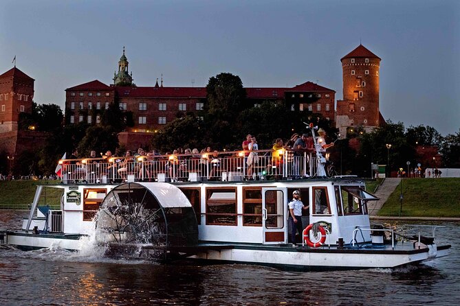 Krakow by night 60 minutes cruise The Vistula River Krakow - Boat setup: top deck views, bar warmth, and the sound reality