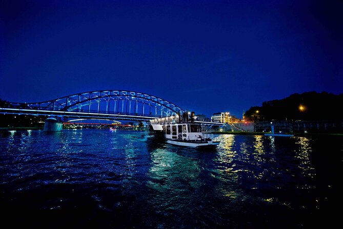 Krakow by night 60 minutes cruise The Vistula River Krakow - Bridges, Bernatek Footbridge, and the “move with the lights” section