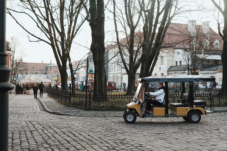 Krakow: City Sightseeing Tour by Golf Cart - The Driver and Audio Guide Mix: What Works Well