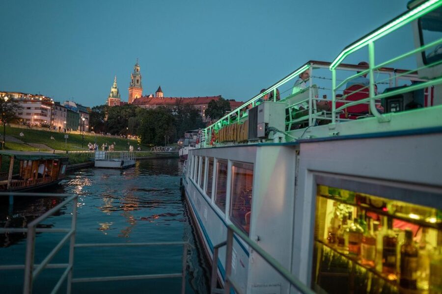Krakow: Evening Cruise with a Glass of Wine - WWII-era landmarks along the river: when history shows up in the night