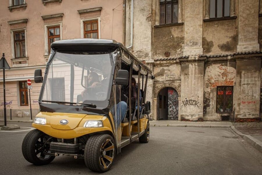 Krakow: Golf Cart City Sightseeing Tour By Old Town District - Why the Multilanguage Audio System and Live Guide Matter