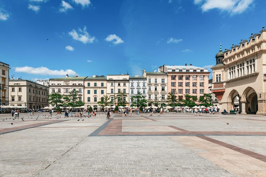 Krakow: Guided E-Scooter City Tour with Food Tastings - Ghetto Heroes Square and Podgórze: Krakow Gets Serious