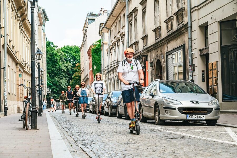 Krakow: Guided E-Scooter City Tour with Food Tastings - Plac Szczepański 8 Start, Then Straight Into Old Town