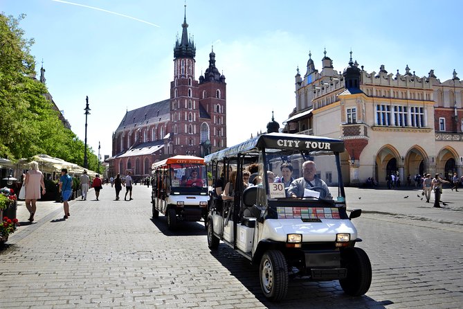 Krakow: Private Guided City Tour by Electric Car - Royal Castle Stop at Wawel, With Photo-Friendly Stops