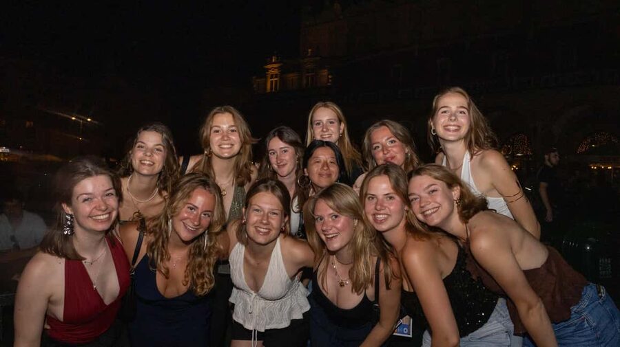 Krakow: Pub Crawl with Shots, Drinks & Skip-the-Line Entry - Krakow Old Town night start: finding the group and getting oriented fast