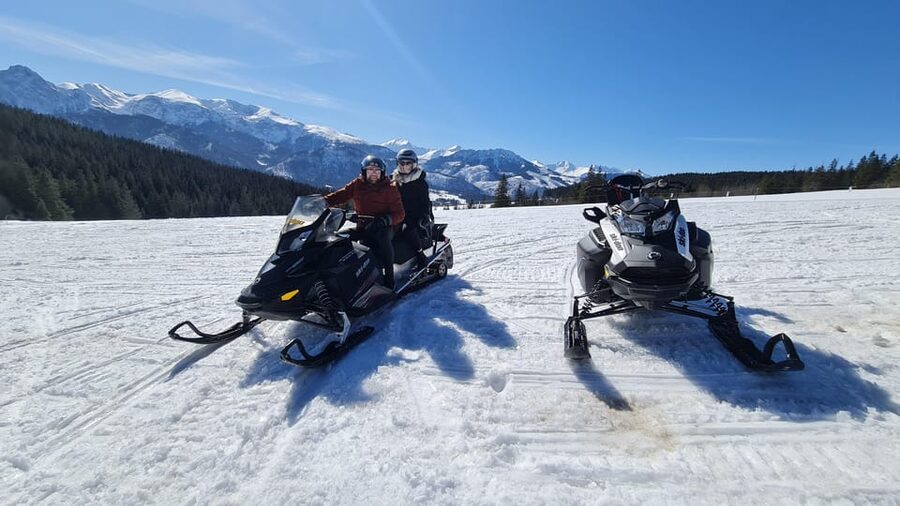 Krakow: Snowmobile & Thermal Baths Zakopane Full Day Tour - Chochołow UNESCO Wooden Village and the sculptor’s hut experience
