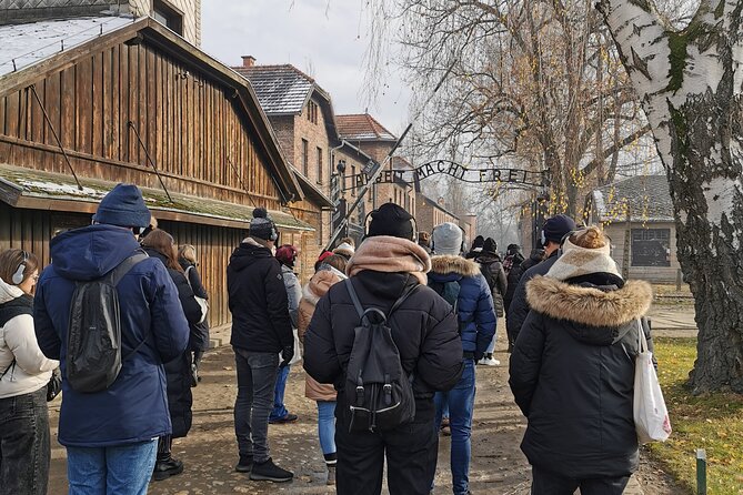 Krakow to Auschwitz Birkenau Guided Tour with Transfer and Ticket - Auschwitz I: The Gate, the Exhibits, and the Weight of the First Camp