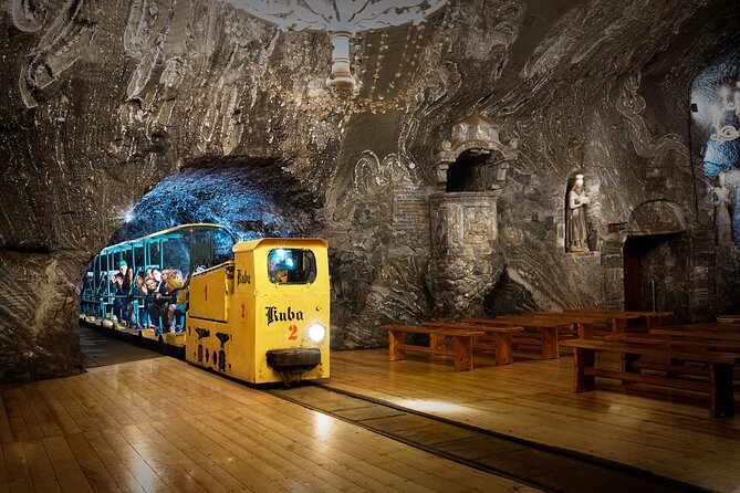 Krakow: UNESCO Bochnia Salt Mine Tour & Boat Expedition - The main underground tour: audioguide, multimedia exhibits, and the mining elevator ride