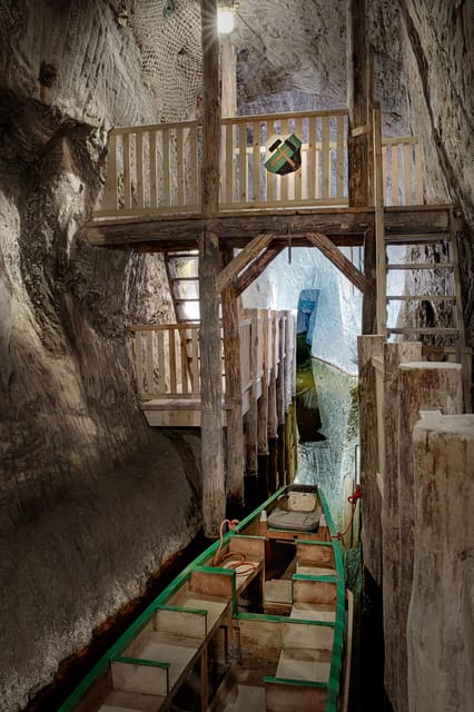 Krakow: UNESCO Underground Boat Expedition & Salt Mine Tour - Riding the mining train: tunnels, views, and a real shift in perspective