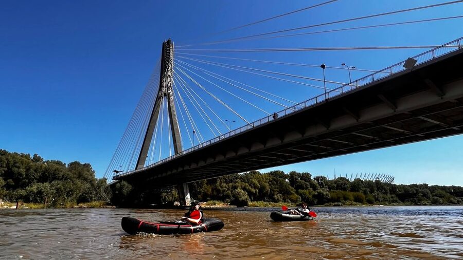 Packrafting kayaking guided tour Vistula river Warsaw Poland - The 2 hour flow on calm harbor water, then downstream