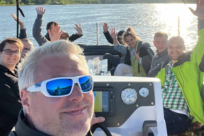Private Cruise on Vistula in Warsaw for 9 with our Helmsman - Royal Castle and the Old Town, framed by the river