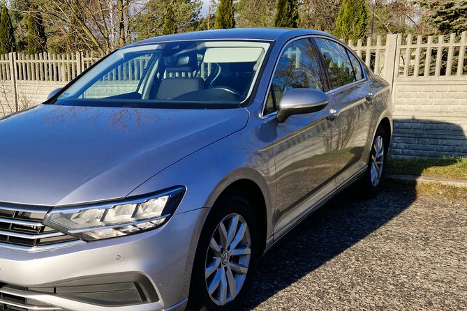 Private Taxi from or to the Krakow Airport - Finding Your Driver at the Kraków Arrivals Hall With Your Name Sign