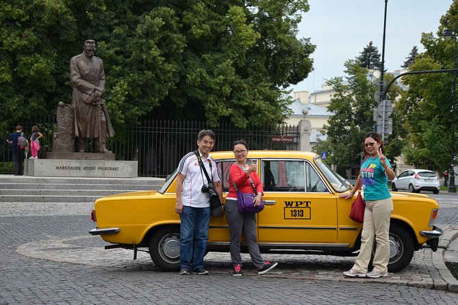 Private Tour: Warsaw City Sightseeing by Retro Fiat - Old Town UNESCO, 13 rebuilt buildings, and how the guide helps you see