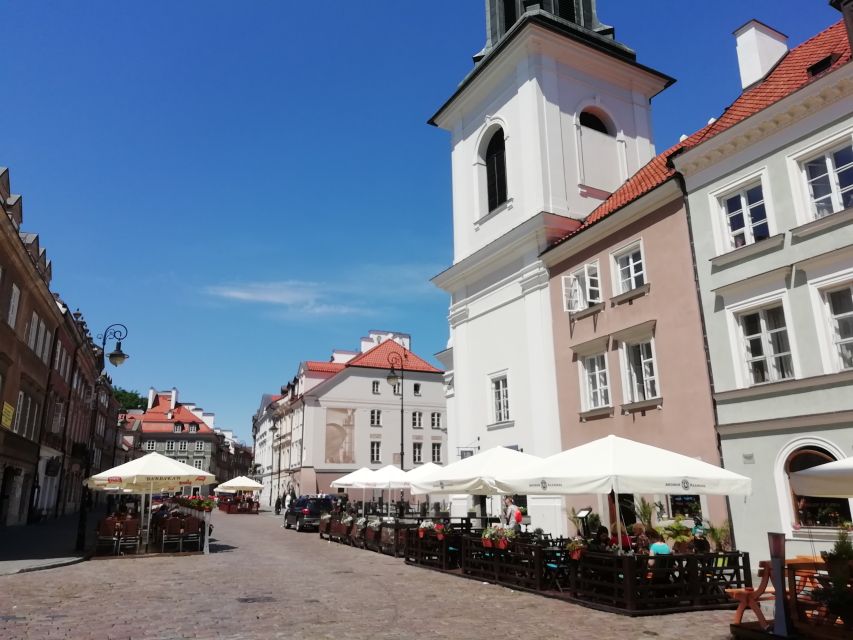 Warsaw: 2-Hour Old Town Walking Tour - Canaletto paintings and the restoration logic behind the scenes