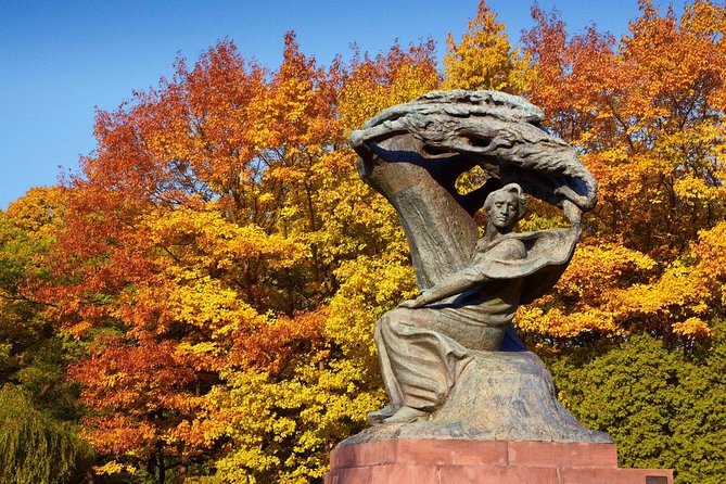 Warsaw Layover City Tour by car with airport pick-up - Lazienki Krolewskie: Chopin Monument, Palace on the Isle, and a Reset from City Noise