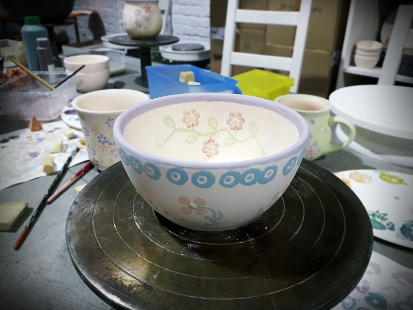 Warsaw: Pottery Decorating Ceramic Workshop - Practice first with testers, then paint your selected form