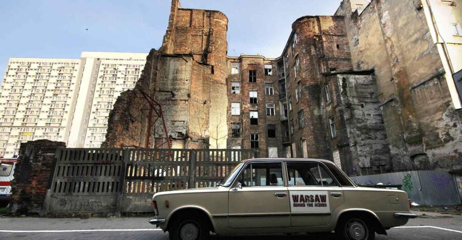 Warsaw: WWII Private Tour by Retro Minibus with Hotel Pickup - The Ghetto Stops: Wall Fragments, Waliców Street, and Chłodna’s Wooden Bridge
