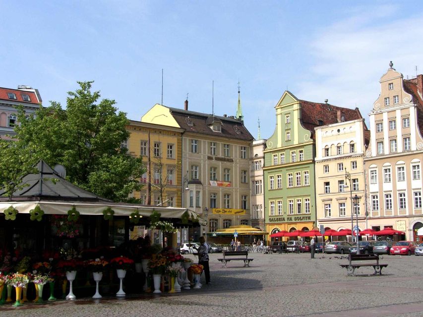 Wroclaw: 2-Hour Tour by Electric Car with a driver-guide - Audio guide and driver-guide options, what to choose