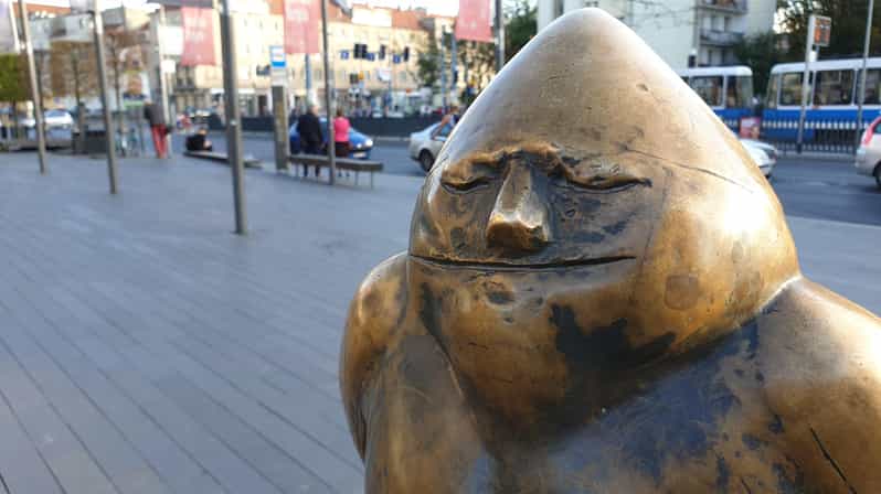 Wrocław: Following the dwarfs'. See the city differently! 2h - University of Wrocław: the Dwarf Swordsman story sticks because it is human