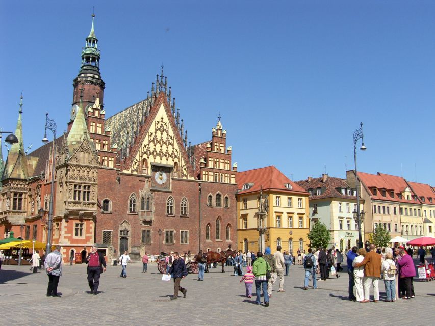 Wrocław: Long City Walk and River Cruise - Wrocław Market Hall and a Quick Bite Moment