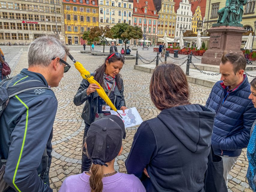 Wrocław: Old Town and Ostrów Tumski Walking Tour in English - Crossing into Ostrów Tumski by stepping onto Cathedral Island
